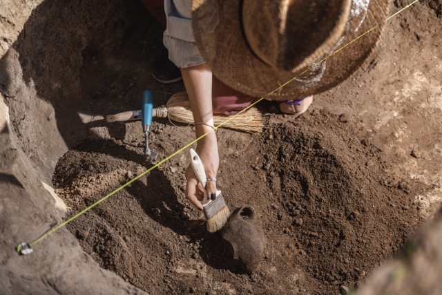 Archaeology – Archeologist Revealing Old Ceramic Object